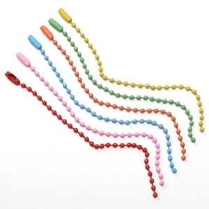 Detail of multi-colored painted iron bead chains with connectors for DIY jewelry making