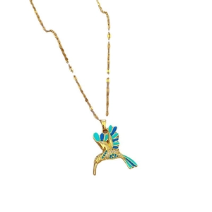 Elegant gold-plated hummingbird necklace with blue enamel wings and sparkling zircon accents