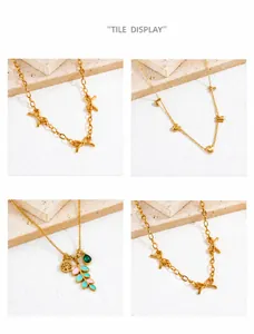 Detail of gold-plated stainless steel necklaces with Lucky letters and tree pendant