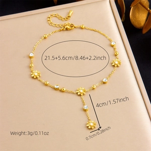 Detail showing gold daisy anklet dimensions with length measurement lines and lobster clasp