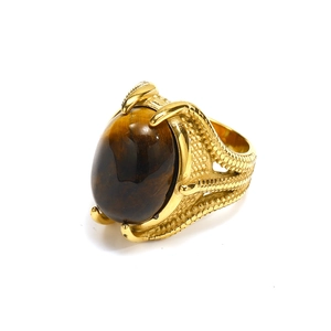 Retro punk men's gold ring featuring an oval tiger eye stone with eagle claw setting