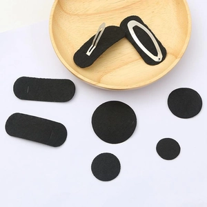 Black felt pads for DIY hair accessories including round and oval shapes with hair clips