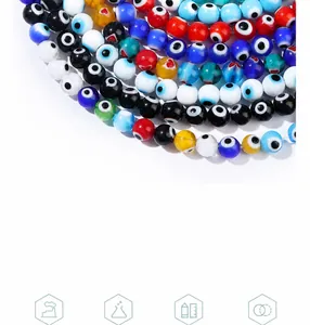 Macro detail of handmade colorful evil eye glass beads with heart patterns for DIY jewelry