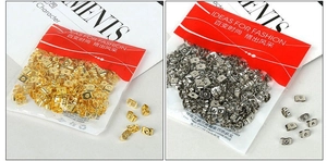 Macro shot of gold and silver butterfly earring backs for DIY jewelry supplies