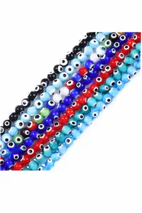 Macro shot of colorful glass evil eye loose beads for DIY jewelry and crafts making