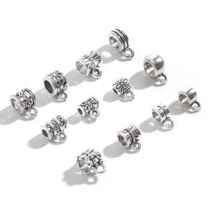 Set of 11 antique silver alloy cylinder charms with floral and textured DIY patterns