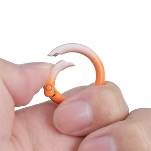 Orange gradient alloy spring ring keychain hook showing the open hinge mechanism detail