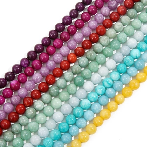 Rainbow colored round beads for DIY bracelets showing smooth surface and vibrant gloss