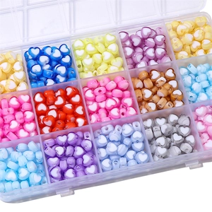 Colorful acrylic heart beads kit for DIY jewelry in a clear 15-grid organizer box