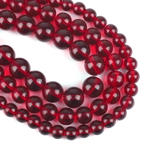 Macro shot of deep red translucent glass beads for DIY necklaces and bracelets