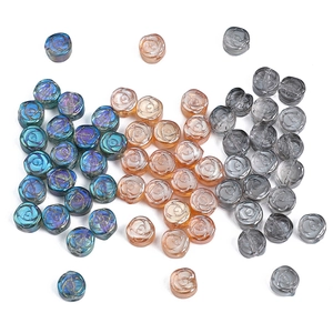 Polished clover and rose glass beads in iridescent blue and champagne for jewelry making