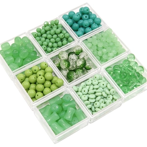 9-grid set of green DIY crystal glass beads in various shapes for jewelry making