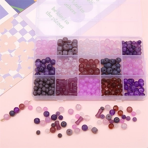 DIY bead set featuring purple and pink glass beads in a 15-grid storage organizer box