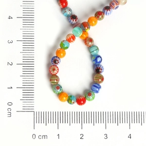 Detailed view of 4mm-6mm colorful millefiori glass beads with measuring scale for DIY jewelry