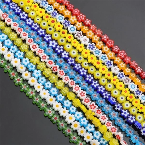 Macro detail of colorful millefiori glass flower beads for handmade jewelry design