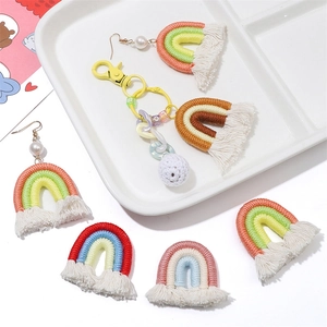 Handmade woven rainbow keychain and earrings set with tassels and colorful beads