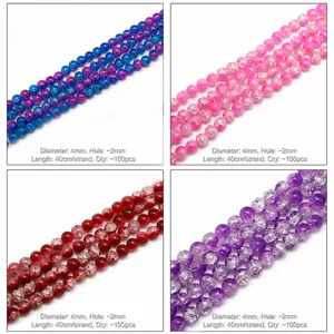 Macro view of 4mm gradient crackle glass beads in pink, blue, red, and purple colors
