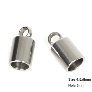 Detailed macro of 4.5x8mm stainless steel end caps with 3mm hole for DIY jewelry