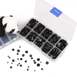 Flatback acrylic panda eye beads set for DIY doll making in a clear plastic storage box