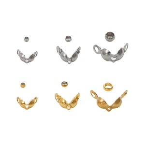 Stainless steel clam shell bead tips and crimp beads set in gold and silver finishes