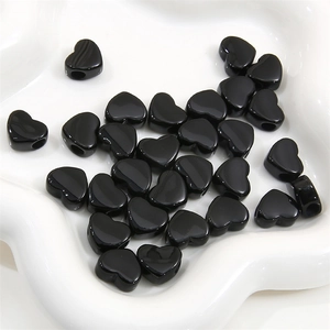 Perles acryliques noires en forme de cœur avec grands trous pour création de bijoux