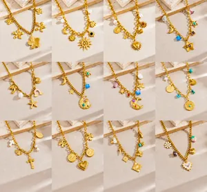 Detailed close-up of diverse gold-plated stainless steel pendants with bohemian motifs