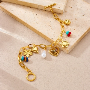 Elegant gold chain bracelet with flower heart charms and colorful natural stone beads