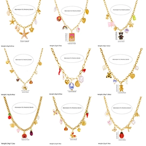 Golden alloy necklace set featuring enamel charms like bears and butterflies