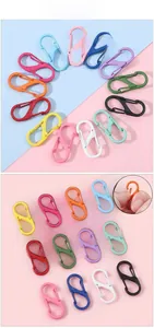 Detail of colorful S-shaped dual-spring snap carabiners for DIY keychains in various hues
