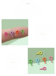 Macro detail of colorful mini painted metal eye pins for DIY handicraft jewelry making