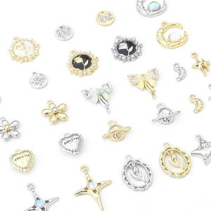 Assorted silver and gold DIY pendants with tulip and star shapes for jewelry making