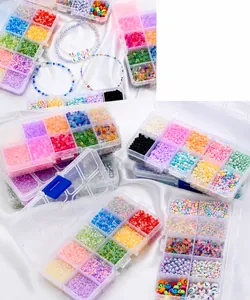 Detail view of 10-compartment DIY bead kit with matte letter and smile face beads