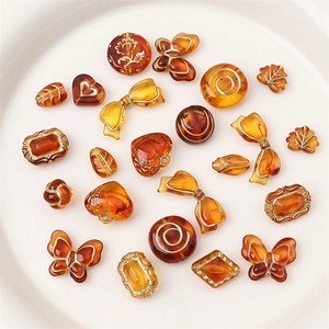 Retro amber acrylic jewelry beads with gold-painted edges for DIY bracelet making