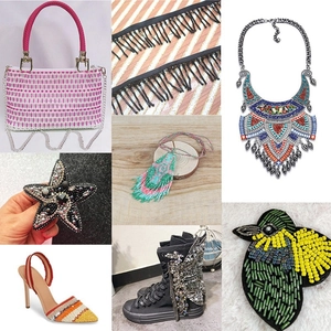 Collection of handmade DIY jewelry supplies including glass beads, sequins, and tassels
