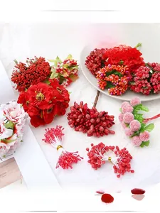 Detail of colorful artificial foam berries and flower heads for DIY hair accessories