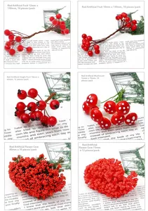 Macro detail of red artificial berries and foam mushrooms for DIY floral hair pins