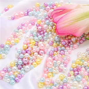 Macaronkleurige ABS imitatieparels set voor DIY sieraden op witte zijden stof