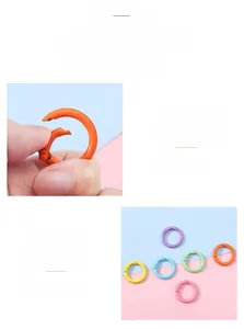Macro detail of 25mm colorful alloy spring O-ring connectors for DIY keychain and jewelry