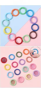 Macro detail of multi-color alloy spring O-rings for keychains and DIY crafts