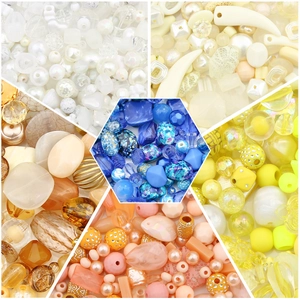 Macro display of diverse Baroque acrylic beads and charms for DIY jewelry making