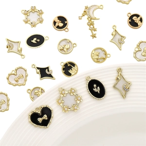 Detailed collection of vintage alloy charms featuring pearls and floral motifs for DIY jewelry