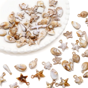DIY acrylic ocean charms with marble texture including stars and butterfly shapes