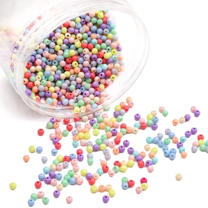 Colorful 4mm acrylic round beads for DIY jewelry spilling from a clear storage jar