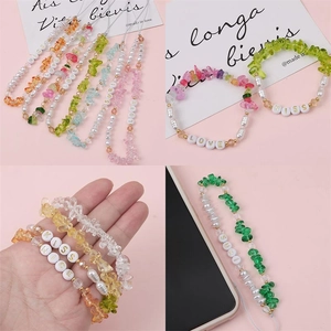 Colorful crystal beaded phone charms with letter beads and pearls in soft pastel colors