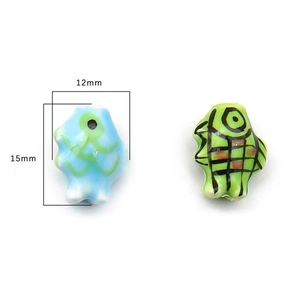 Hand-painted fish-shaped ceramic beads for DIY jewelry making in blue and green tones