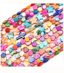 Macro view of colorful mixed shape natural shell beads for DIY jewelry making