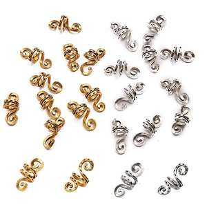 Antique gold and silver spiral braid rings with embossed dot pattern and boho style