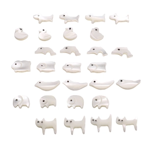 Natural white shell animal beads for DIY jewelry making featuring dolphins and elephants
