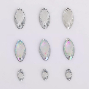 Macro view of multi-faceted acrylic marquise sewing rhinestones with dual-hole design