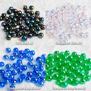 Macro view of AB coated acrylic beads in four colors for DIY jewelry making